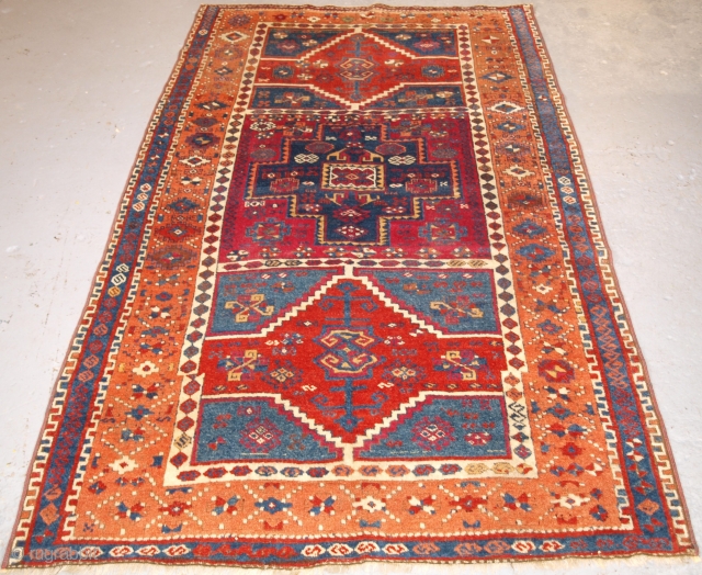 Antique Eastern Anatolian Kurdish Yuruk long rug with three boxed medallion design. www.knightsantiques.co.uk 

Size: 7ft 1in x 4ft 3in (216 x 130cm).

Circa 1880.

An excellent example of a Yuruk long rug, with a  ...