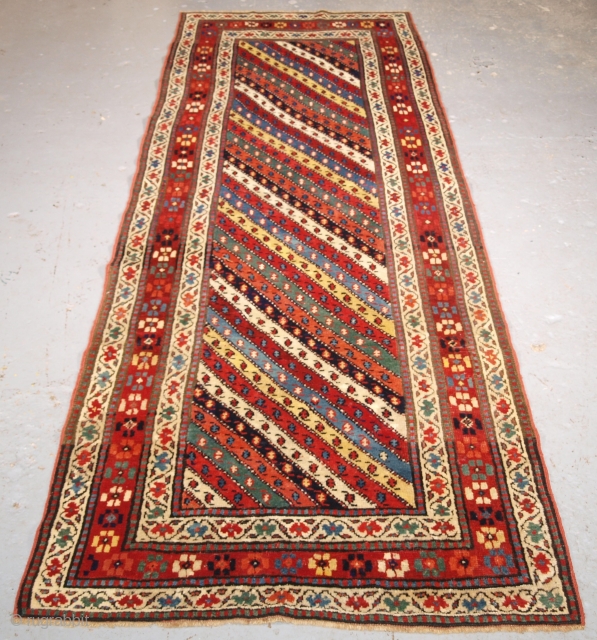 Antique Caucasian long rug with superb colour, 260 x 97cm.                       