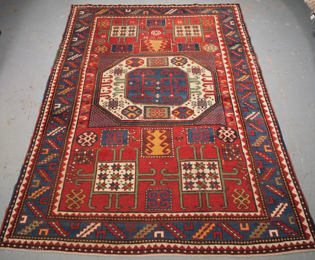 Antique Caucasian Karachov Kazak rug of classic design on a red ground. www.knightsantiques.co.uk 
Size: 7ft 4in x 5ft 4in (224 x 163cm). 
Circa 1880.

A good example of a Karachov Kazak rug with  ...