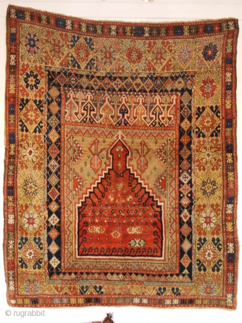 Antique Turkish Mujur prayer rug of classic design with a superb range of colours. www.knightsantiques.co.uk
Size: 6ft 1in x 4ft 9in (186 x 145cm).

Mid 19th century.

Mujur is in central Anatolia, this rug is  ...