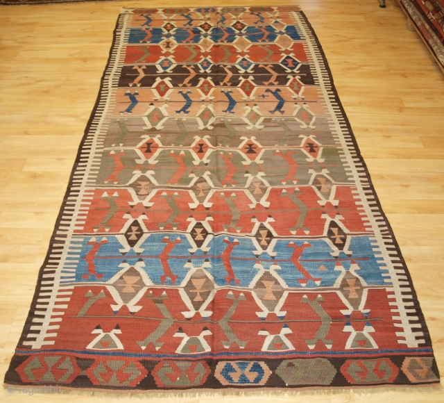 Size: 10ft 3in x 4ft 4in (312 x 133cm). www.knightsantiques.co.uk 

Antique Central Anatolian Konya kilim of striking design with superb colours.

Circa 1880.

An excellent kilim with pleasing soft colour and traditional geometric design.  ...