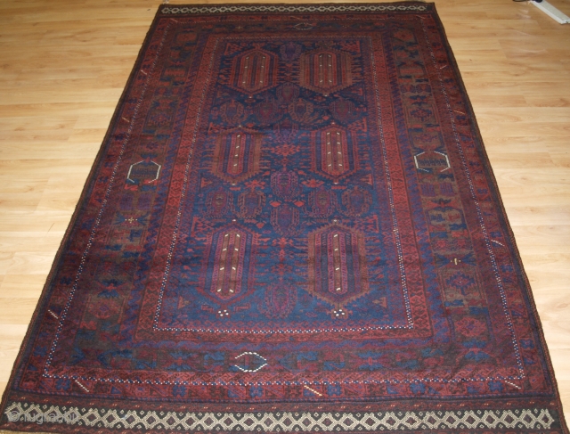 Antique Afghan Timuri Baluch rug from Western Afghanistan. www.knightsantiques.co.uk Size: 8ft 0in x 4ft 11in (245 x 151cm). 

Circa 1880.

A good Timuri Baluch rug from Western Afghanistan, with very dark indigo blue  ...