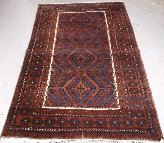 ***Spring sale*** £695.00 click the link www.knightsantiques.co.uk to view more items.

Size: 6ft 3in x 3ft 10in (190 x 118cm).

Antique Afghan Baluch rug of traditional ‘mushwani’ design, the rug is of a dark  ...