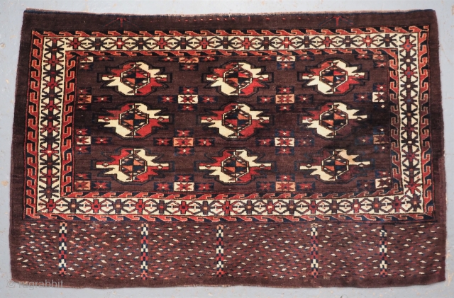 Antique Yomut Turkmen nine gul chuval complete with plain weave back. www.knightsantiques.co.uk 
Size: 3ft 8in x 2ft 6in (113 x 74cm).
Circa 1900.

The chuval is well drawn with a rich colour palette, the  ...