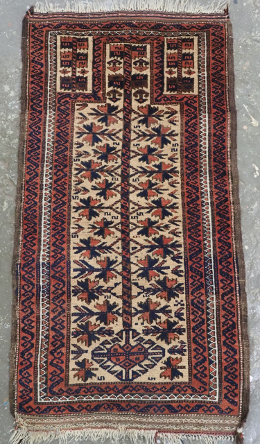 Size: 4ft 0in x 2ft 2in (122 x 66cm).

Antique Baluch camel ground prayer rug of very small size.

Circa 1900.

The rug has a well drawn tree of life design and has excellent colour,  ...