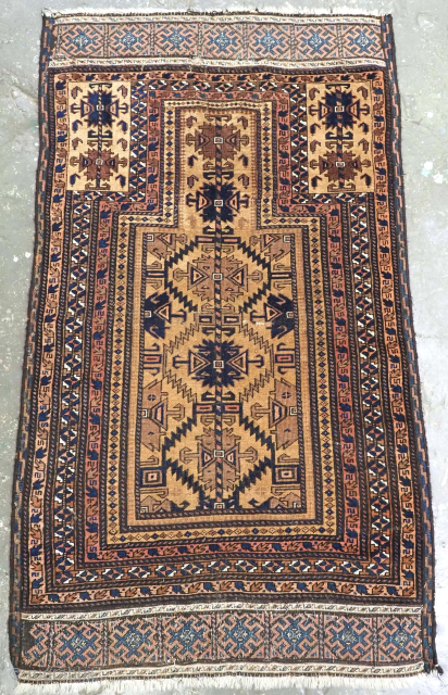Size: 4ft 7in x 2ft 7in (139 x 79cm).

Antique Timuri / Baluch camel ground prayer rug with unusual Turkmen inspired design, from Western Afghanistan.

Circa 1880.

The natural undyed camel wool really glows in  ...