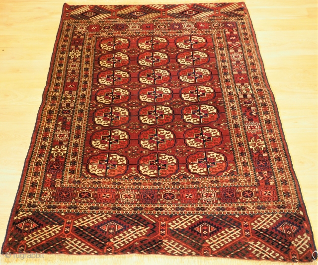 Antique Tekke Turkmen rug of small size with excellent colour. www.knightsantiques.co.uk 
Size: 4ft 8in x 3ft 7in (142 x 108cm).
Circa 1880.

The rug has three rows of seven Tekke guls, these are will  ...