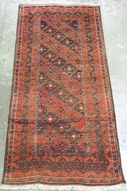 Size: 6ft 3in x 3ft 2in (190 x 96cm).

Antique Afghan Timuri Baluch rug from Western Afghanistan with diagonal lattice design.

Circa 1890.

A good Timuri Baluch rug from Western Afghanistan, the diamond lattice contains  ...