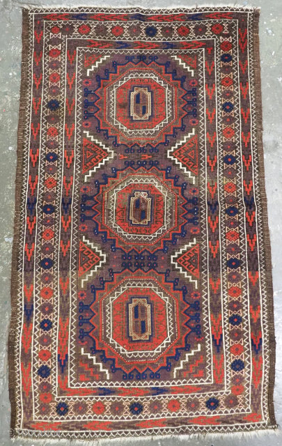 Size: 4ft 6in x 2ft 8in (137 x 80cm).

Antique Khorasan Baluch rug possibly by the Salar Khani Baluch, with turreted gul design.

Circa 1900.

A very sweet small Baluch rug, with a design of  ...