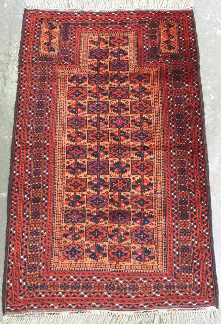 Antique Baluch prayer rug possibly by the Baluch tribes of Turkestan. www.knightsantiques.co.uk 
Circa 1900.
Size: 4ft 0in x 2ft 10in (145 x 91cm).
This is a very unusual prayer rug, with the well known  ...