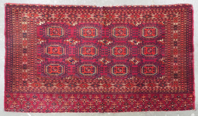 Antique Tekke Turkmen chuval with twelve large 'Salor' turreted guls. www.knightsantiques.co.uk 
Circa 1880.
Size: 5ft 2in x 2ft 11in (157 x 88cm).
Chuval are storage bags used by the Turkmen nomads for the storage  ...