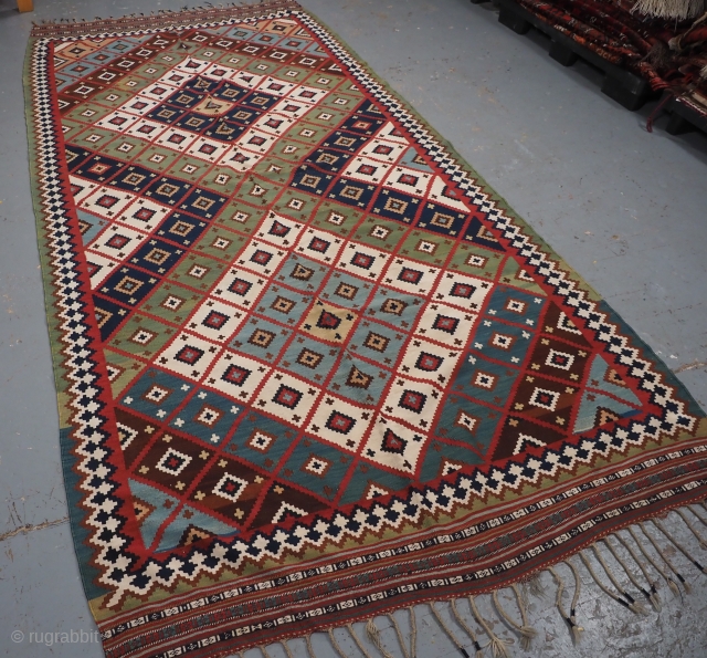 Antique Persian tribal Qashqai kilim, South West Persia.
www.knightsantiques.co.uk
Circa 1890.
Size: 11ft 2in x 5ft 5in (340 x 165cm).
A really outstanding Qashqai kilim with very bold diamond lattice design and wonderful natural dye colours  ...