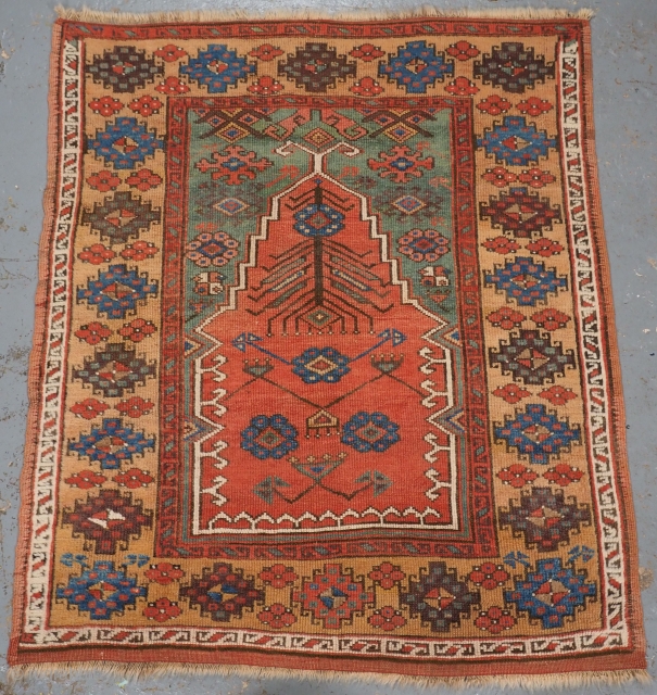 Antique Central Anatolian Konya region village prayer rug.
www.knightsantiques.co.uk
Circa 1850.
Size: 4ft 3in x 3ft 6in (130 x 106cm).
A superb example of a Konya prayer rug, the soft red central mihrab is floating on  ...