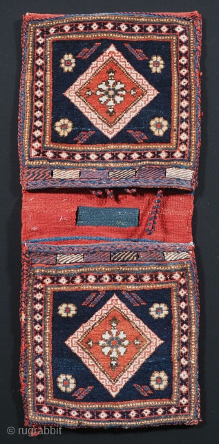 Antique Afshar miniature khorjin (saddle bag) of very small size.
www.knightsantiques.co.uk
Circa 1900.
Size: 2ft 3in x 11in. (69 x 29cm)
Complete khorjin of this quality are quite scarce, this example is in outstanding condition with  ...