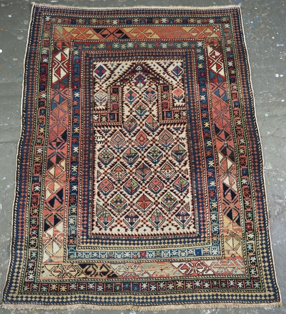 Antique Caucasian Dagestan prayer rug with floral lattice on an ivory ground.
www.knightsantiques.co.uk
Circa 1880.
Size: 4ft 6in x 3ft 5in (137 x 103cm).
A good example of this well known group of prayer rugs, this  ...