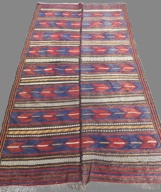 Antique Afghan Baluch kilim with banded chevron design.
www.knightsantiques.co.uk
Circa 1920.
Size: 9ft 10in x 5ft 9in (300 x 175cm).
The kilim is a traditional tribal Baluch kilim, woven on a narrow loom in two strips  ...