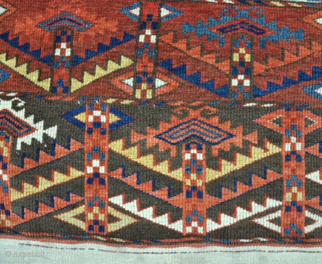 An antique and very colorful Yomud Ensi of fine quality in very good condition for its type. pile just dipping to the collars in one small area, very slightly shaped on one  ...