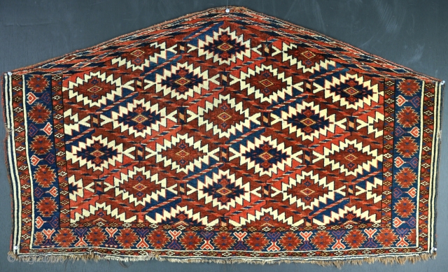 A very fine Yomud Asmalyk with excellent dyes, a few nibbles but otherwise in good order with no repair. lovely back. Circa 1870. 121cm x 67cm       