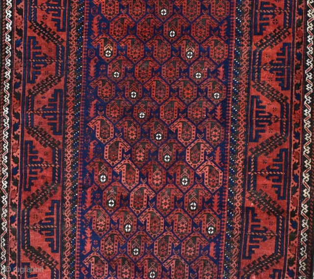 An antique Baluch rug, finely woven with good dyes. Even low pile, original kilim ends. Late 19th century. Not too expensive.            