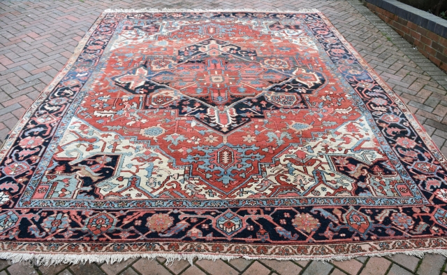 A good Heriz/Karaja carpet. Clear vegetable dyes in good original condition. A solid, clean carpet, washed and floor ready. 383x296cm. Circa 1900           