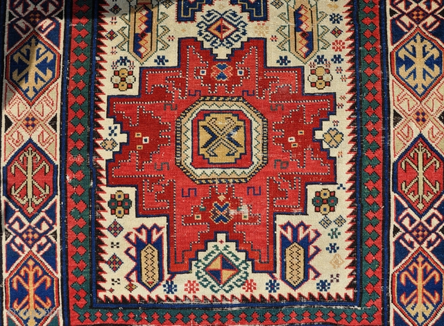 An antique kuba(?) rug with dripping colours and Leshgi design. Mid 19th century. about 6 x4 ft. See it in Stockholm!            