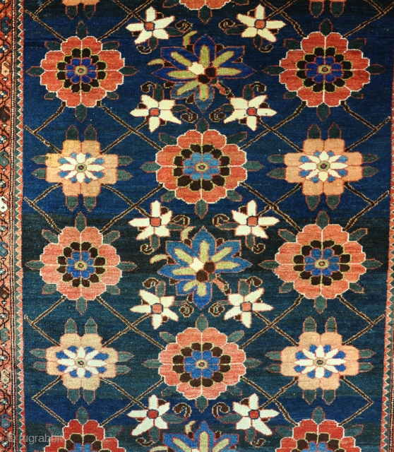 An unusual veremin(?) rug with bold minakhani design. Full pile all over a little faded repair on one extreme end. Lovely size.218x161cm           