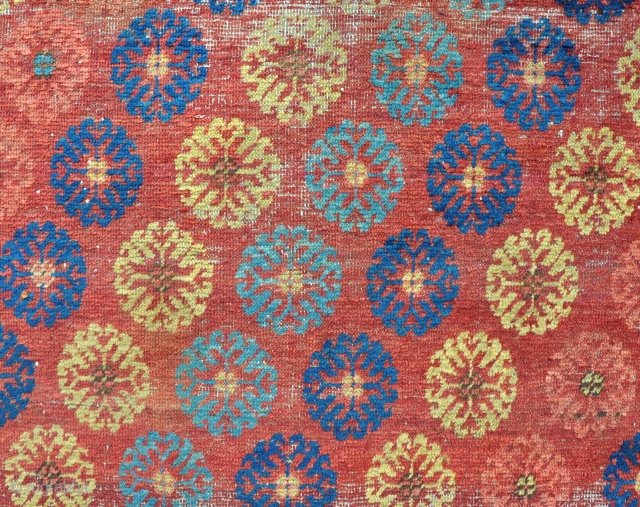 A good Khotan carpet with lovely fresh dyes and soft shiney wool, some wear, but easily fixable having its original selvages and kilim ends, virgin condition, unwashed and untouched. Fresh from the  ...