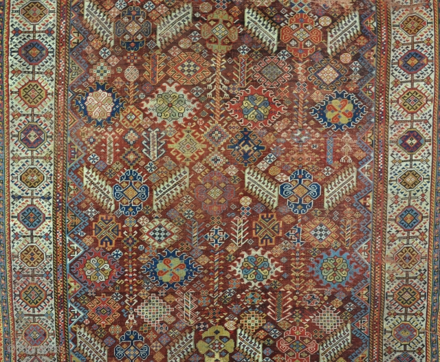 A good antique Shekarlu rug on scarce red ground. A very pretty one with good dyes and some touches of silk in the pile. Alas, evenly worn with slight losses and old  ...