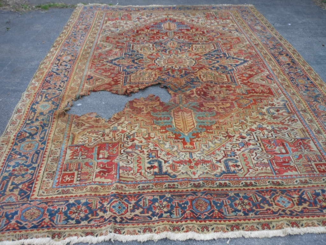 Persian Heriz, early 20th century, 9-3 x 12 (2.82 x 3.66), hole (from plant pot rot) 2-6 x 3, allow 6" past hole for rot, rest of rug is not rotted and  ...