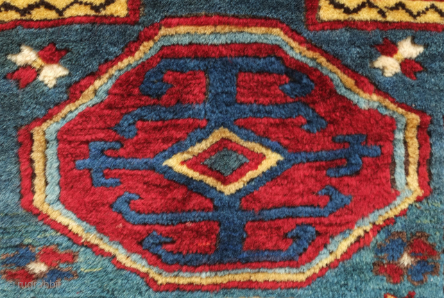 Lesghi Kazak small rug, first half of 20th century or earlier.  Hand spun lambs wool in saturated natural dyes in a fine weave.  The pile is full and plush.   ...