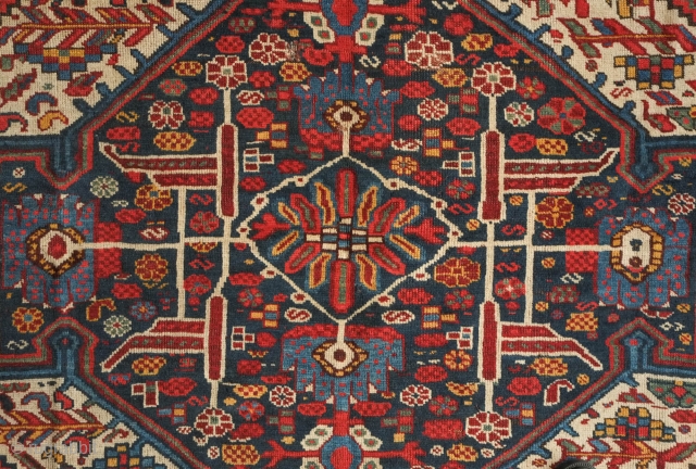 Khamseh Arabi rug, late 19th century. Fantastic colors and design. A couple of repairs and a little moth nibble.  156 x 181 cm         