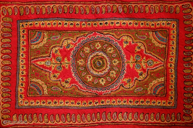 Kerman Embroidery Wall Hanging, Late 19th/early 20th Century. Good colors and workmanship. Loom woven wool ground cloth. Original cotton backing. Metallic thread fringes all around the edges. A gorgeous piece that strikes  ...