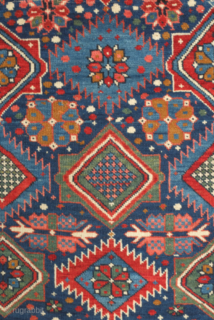 Kuba rug, 19th century.  Stunning saturated colors.  This Kuba rug is brimming with a variety of palmettes and medallions. Striking kufic border. Excellent condition. 128 x 213 cm.  Contact  ...
