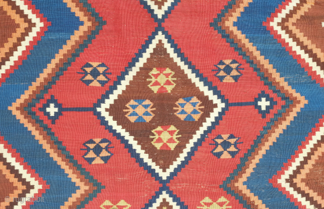 Qashqa'i Kilim, 19th century.  It has a zigzag field design and is in a fine weave. All good colors including a light pistachio green, apricot and a rich brown. Overall good  ...