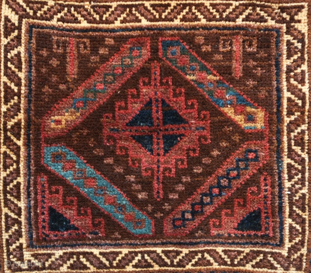 Baluch Bag Face, possibly Maldari, late 19th centurty.  This wonderful beauty has soft wool and uncommon colors.  It has a beautiful green, yellow and aqua blue in the bars surrounding  ...