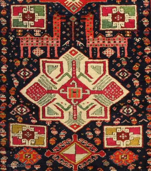 Akstafa long rug, 19th century.  Excellent colors generously applied.  The wool is extremely soft and velvet-like.  Two inward facing speckled camelids in the center.  I count around 9  ...