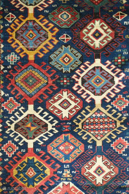 Shirvan Runner, 3rd to 4th Quarter of the 19th Century. Fantastic colors. Hooked medallion aligned in two columns. The rug has some worn spots and a section at the bottom that was  ...