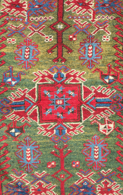 Dosemealti rug, 19th century.  This rug has an incredible rich green field and main border in lustrous wool.  Excellent pile with a slightly lower section in the top of the  ...