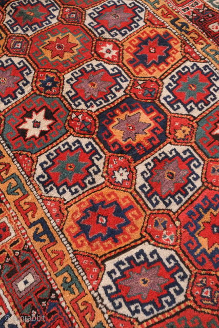 Quchan Kurdish rug, late 19th century.  Extraordinary colors and condition.  The pile is full.  Colors include an exceptional purple, green and apricot. A real gem. 158 x 358 cm  ...