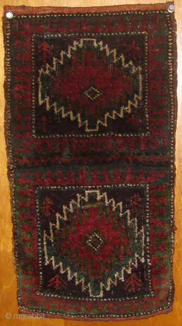 Wonderful small Baluch chanteh, 19th century, in beautiful condition, with original ends and sides.  All dyes natural including desirable green.  Roughly 10" by 17".  Please ask for more photos 