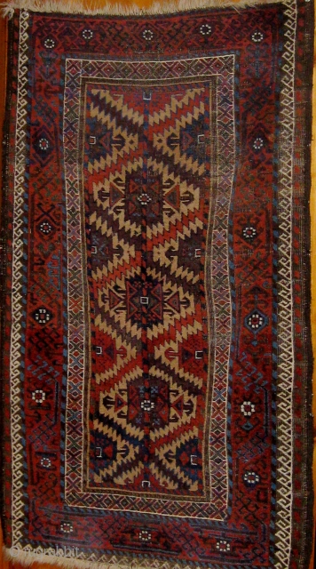 Beautiful 19th century Baluch carpet, extremely rare field design, with a beautiful array of blues, all natural dyes.  In good condition, edges all original, ends reduced, usual oxidation of the brown  ...