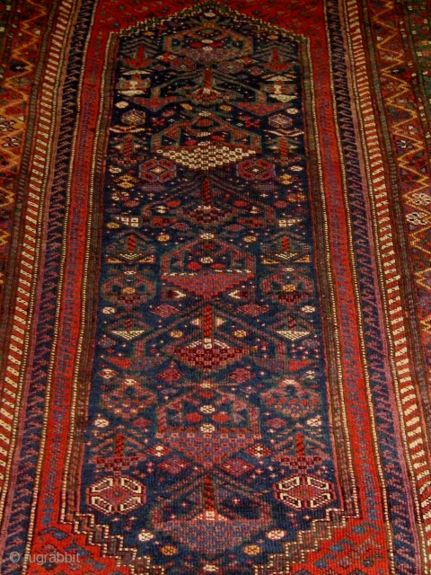 Antique Kurdish Sauj Bulagh "main carpet", last quarter of the nineteenth century, 5' by 8'5", in lovely condition, with one end still retaining its original flatweave finish.  Red wefts as is  ...