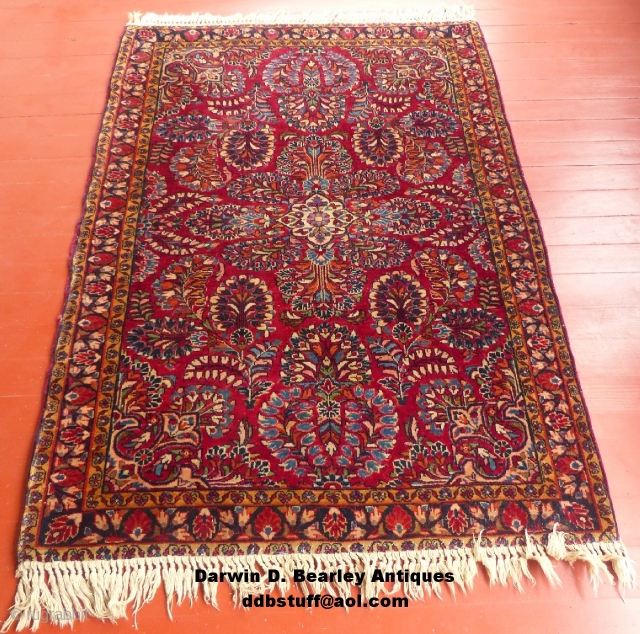 This is an antique Sarouk.
It is all wool with a cotton foundation.
It dates from c.1900-1920.
It is in excellent condition with full pile 
The fringe is not original.
This rug measures 57" X 40".

SOLD 