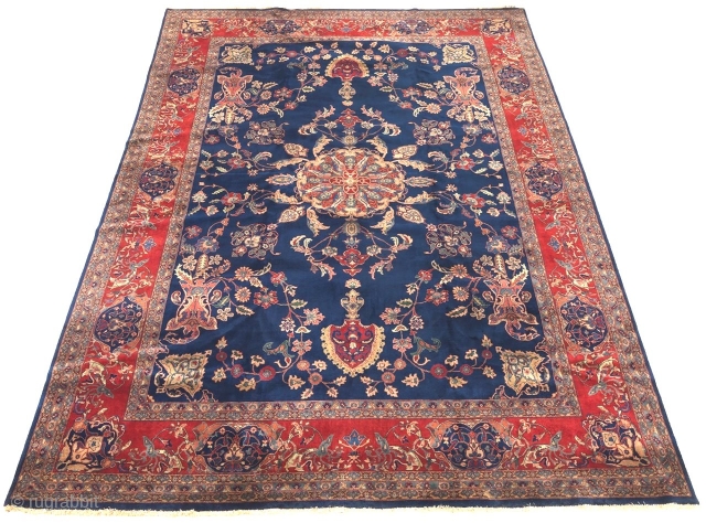 THIS IS A BEAUTIFUL PERSIAN KASHAN c.1940's.
Medium low lush dense silky wool pile on cotton foundation.
Very finely hand-knotted.
The field has multicolor palmette floral designs on navy blue background.
 Corner guards and borders  ...