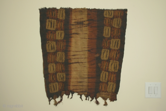 Africa: woman's tubular garment of resist dyed rafia fiber, each side 29 x 33 inches (74 x 84cm), Dida tribe, Ivory Coast, circa 1900, with some wear and losses.    