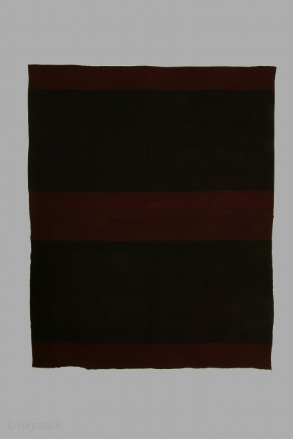 Bolivian woman's mantle (nanaka), alpaca wool, 19th century, 43 x 52 inches. The color balance of this nanaka is atypical. Most nanakas have a color balance of black outer bands and central  ...
