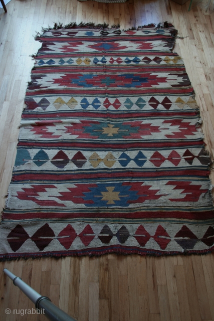 Anatolian kilim, Mut region, 59 x 94 inches (148 x 238cm), circa 1850, some damage and some reweaving as can be seen in the images. The design is atypical for a Mut  ...