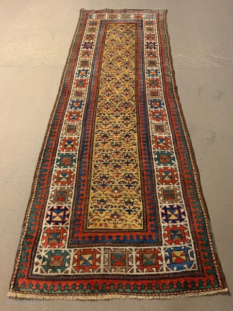Sweet Gendje runner, 262 x 92 cm. 

Low to medium pile. No holes, pests or odors. 

Great colors (note the aubergine), ca. 1875.          
