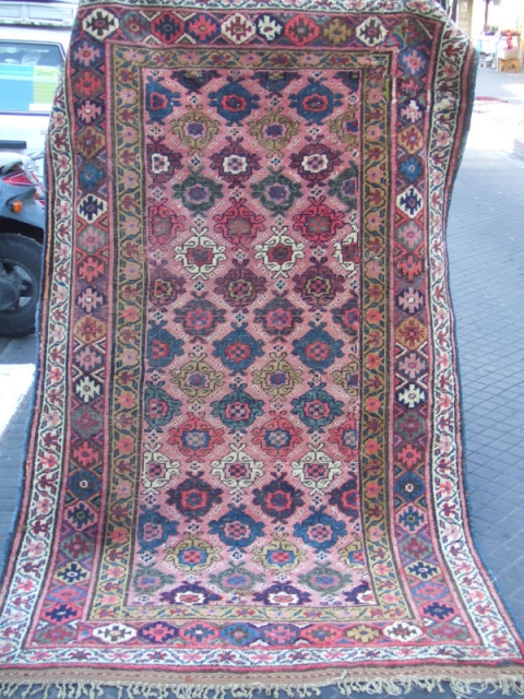 ANTIQUE KURDISH RUG wool on wool .The rug have really amazing background color and unique patterns.
The rug has been fixed in some places(as you can see on the pictures)Very uniqe design!Size:210x132-cm /  ...