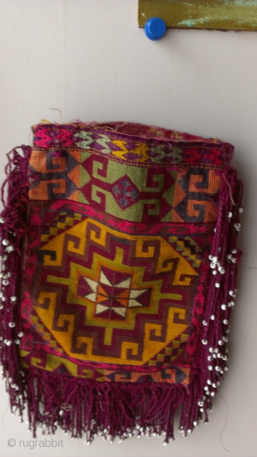 This is a turkmen bag that some people were using it for coins, tobacco, mirror or wooden comb however these kinds of pieces are usually made for dowry so it was made  ...